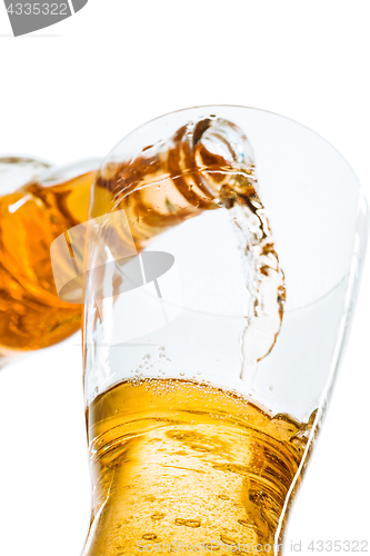 Image of Glass of beer and bottle