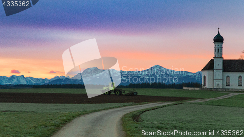 Image of Alpine morning landscape with green agricultural fields