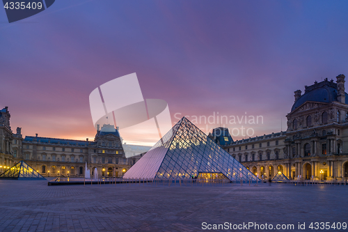 Image of View of famous Louvre Museum with Louvre Pyramid