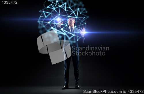 Image of businessman with virtual low poly projection