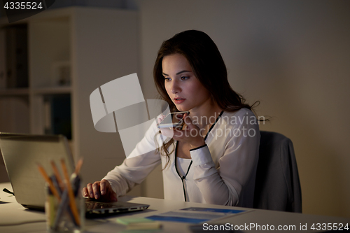 Image of woman using voice command recorder on smartphone