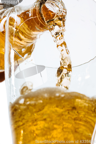 Image of Glass of beer and bottle