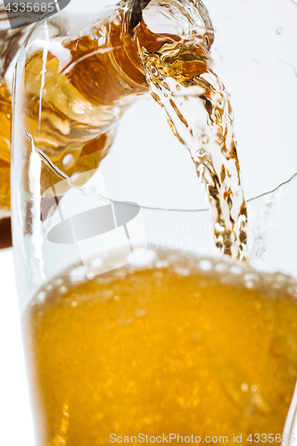 Image of Glass of beer and bottle