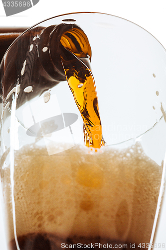 Image of Glass of beer and bottle