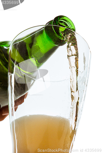 Image of Glass of beer and bottle