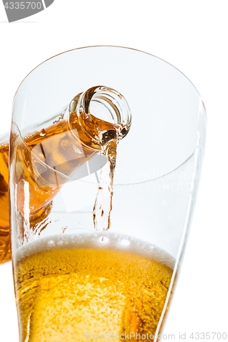 Image of Glass of beer and bottle