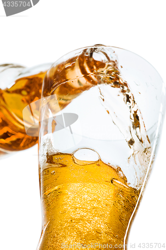 Image of Glass of beer and bottle