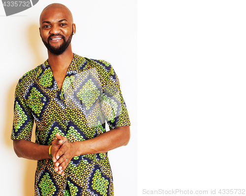 Image of portrait of young handsome african man wearing bright green nati