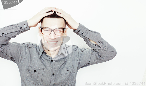 Image of young handsome teenage hipster guy posing emotional, happy smiling against white background isolated, lifestyle people concept 