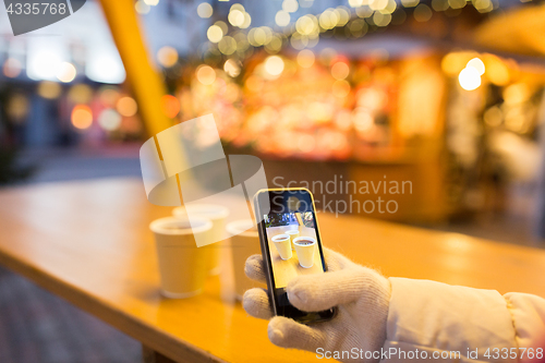 Image of mulled wine picture on smartphone at christmas
