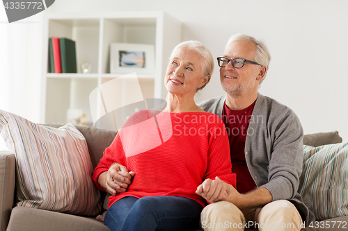 Image of happy smiling senior couple at christmas