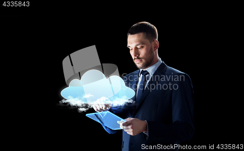 Image of businessman with tablet pc and cloud hologram