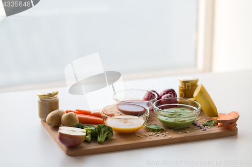 Image of vegetable puree or baby food in glass bowls