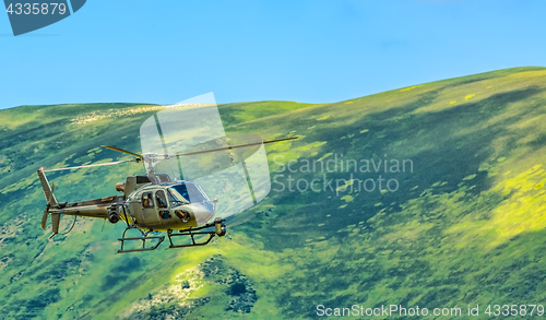 Image of Helicopter in Mountains