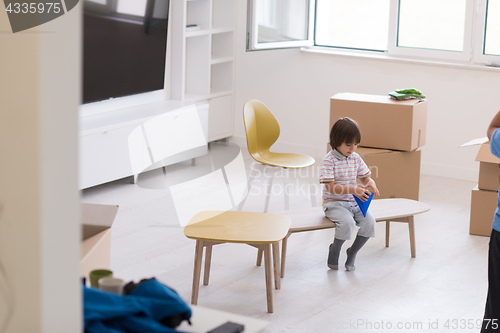 Image of boys in a new modern home