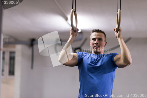 Image of man doing dipping exercise