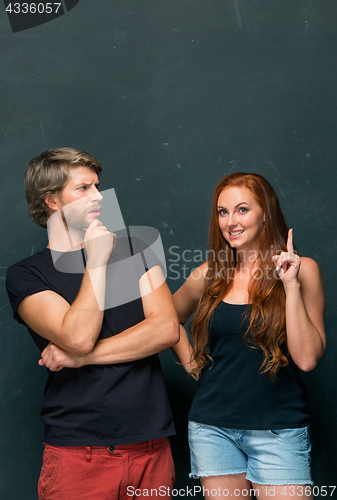 Image of Young couple remembering and thinking about something