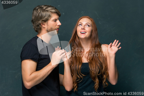 Image of Young couple smiling