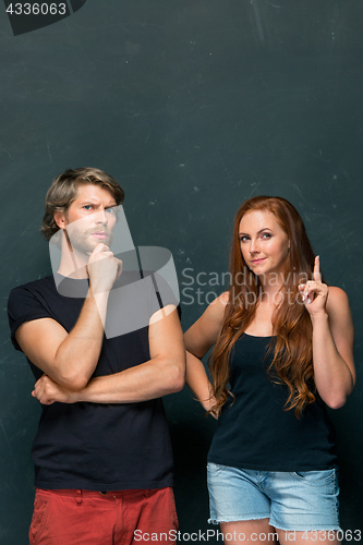 Image of Young couple remembering and thinking about something