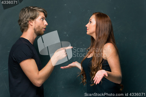 Image of Young couple smiling