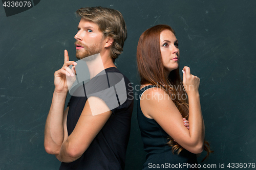 Image of Young couple remembering and thinking about something