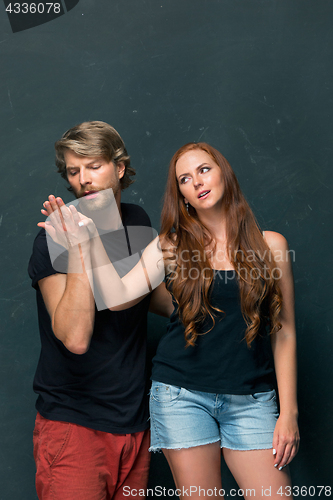 Image of Young couple smiling