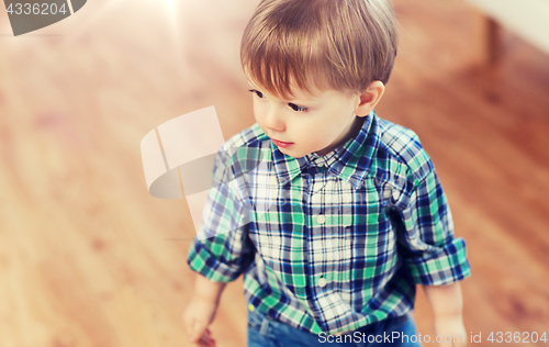 Image of happy little baby boy at home