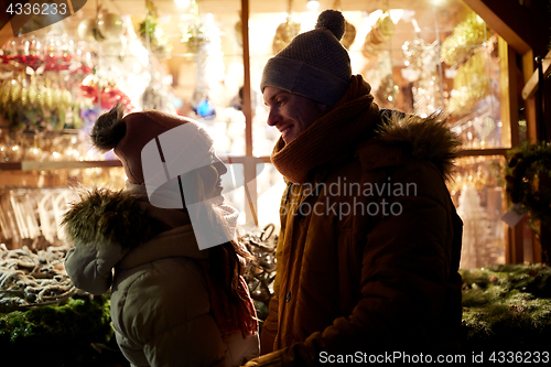 Image of close up of happy couple in winter closes