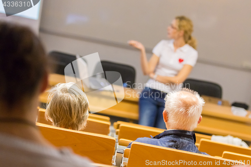 Image of Instructor teaching first aid cardiopulmonary resuscitation workshop.