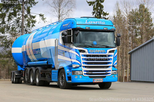 Image of Blue and White Scania Tank Truck Parked