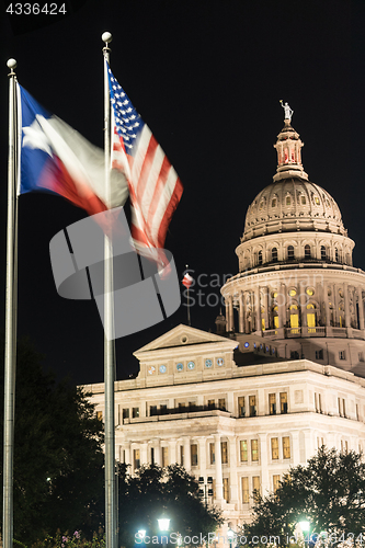 Image of Flags Fly Night Falls Austin Texas Capital Building Motion