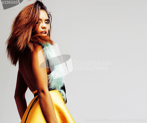 Image of young pretty african-american woman posing in fashion clothers e