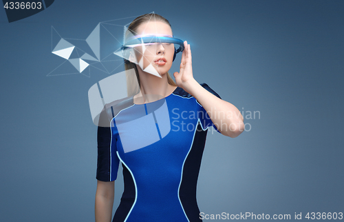 Image of woman in virtual reality 3d glasses with hologram