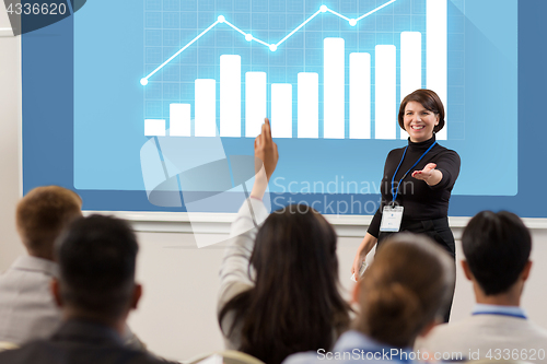 Image of group of people at business conference or lecture