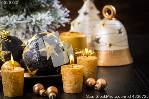 Image of Christmas balls with candles 