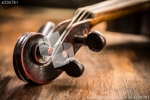 Image of Violin in vintage style on wood background