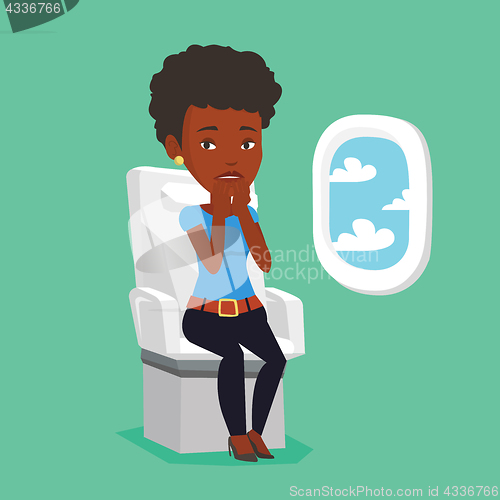 Image of Young woman suffering from fear of flying.