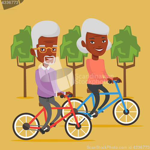 Image of Senior couple riding on bicycles in the park