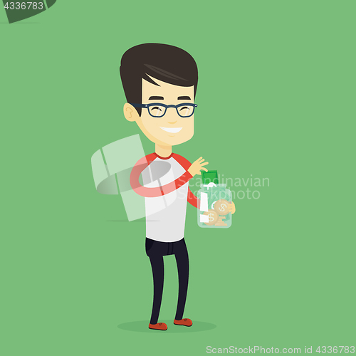 Image of Man putting dollar money into glass jar.