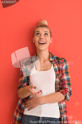 Image of young woman over color background