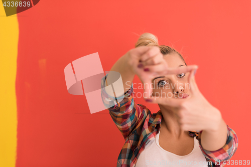 Image of young woman over color background