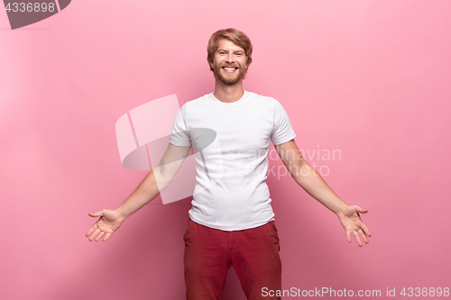 Image of Portrait of young man with happy facial expression