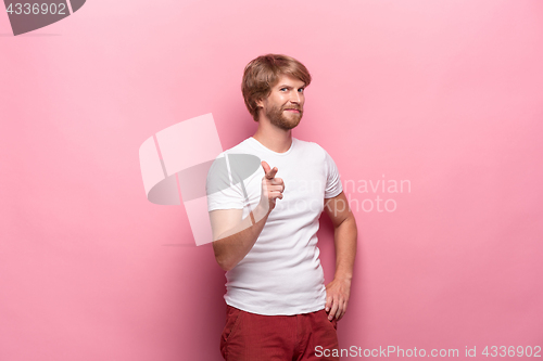 Image of Portrait of young man with happy facial expression