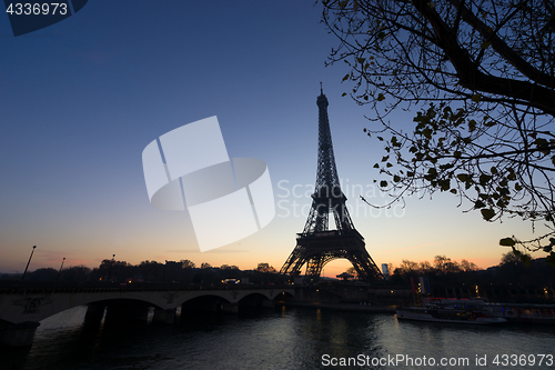 Image of The Eiffel tower at sunrise in Paris 