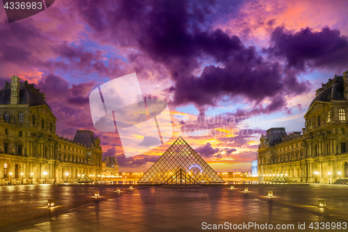 Image of View of famous Louvre Museum with Louvre Pyramid