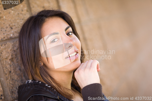 Image of Beautiful Happy Mixed Race Young Woman Portrait Outside.