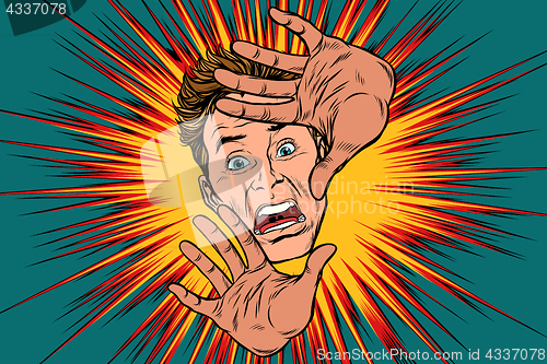 Image of Scared man covered with hands