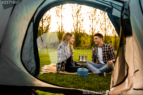 Image of Young couple camping