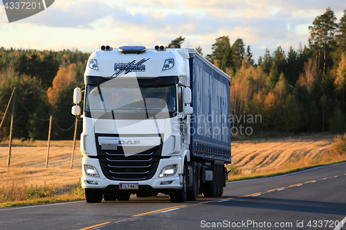 Image of White DAF XF Truck Transport in Autumn