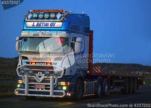 Image of Customized Scania Semi Trucking at Dusktime